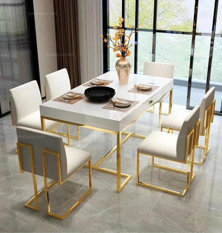 White gloss and gold dining set
